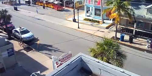 Pedestrians on the street in the city center webcam - Key West